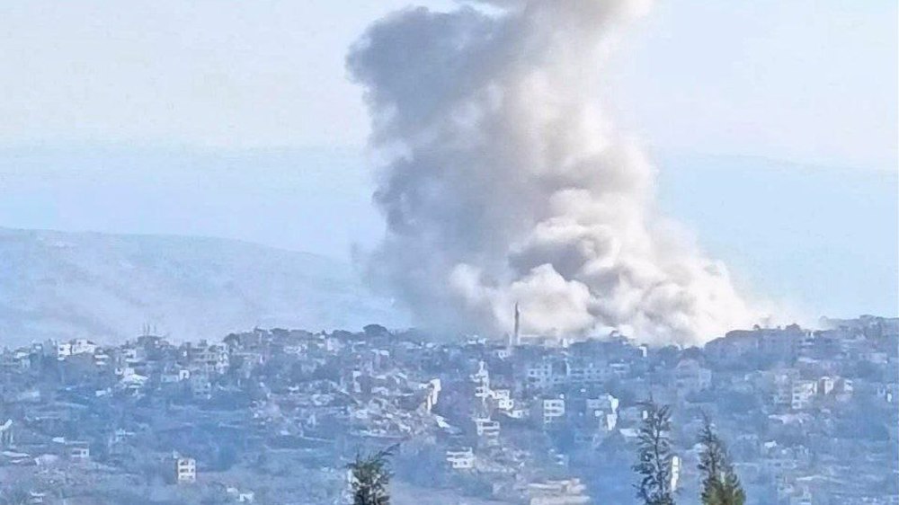 Israeli forces detonating buildings in the eastern parts of the city of Khiam, southern Lebanon. Israeli forces detonating buildings in the eastern parts of the city of Khiam, southern Lebanon.